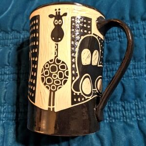 Giraffe in the City Mug by Jennifer Falter - Artful Home